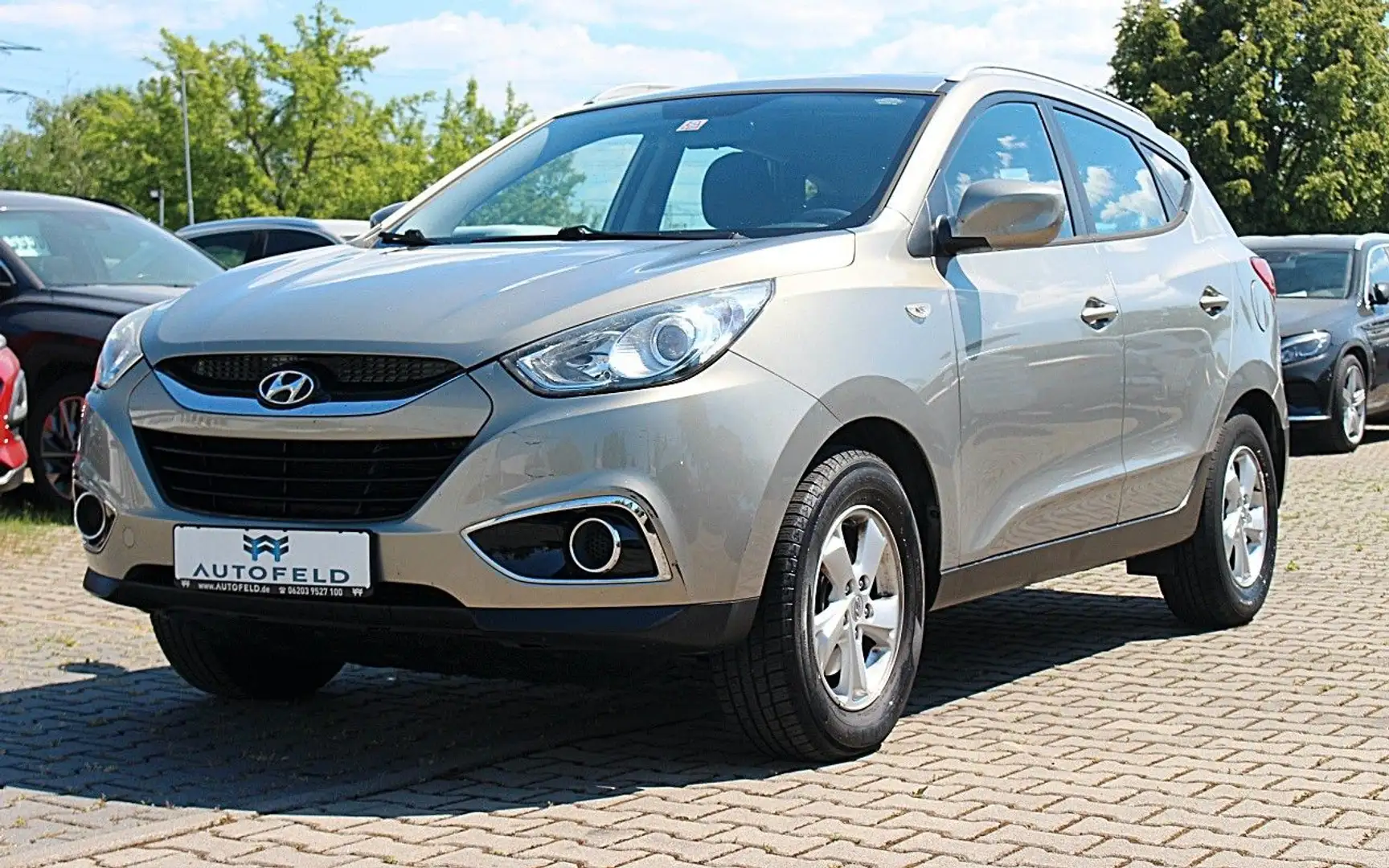 Hyundai iX35 1.6 Comfort/SHEFT/AHK/BT/KLIMA/ Grijs - 1