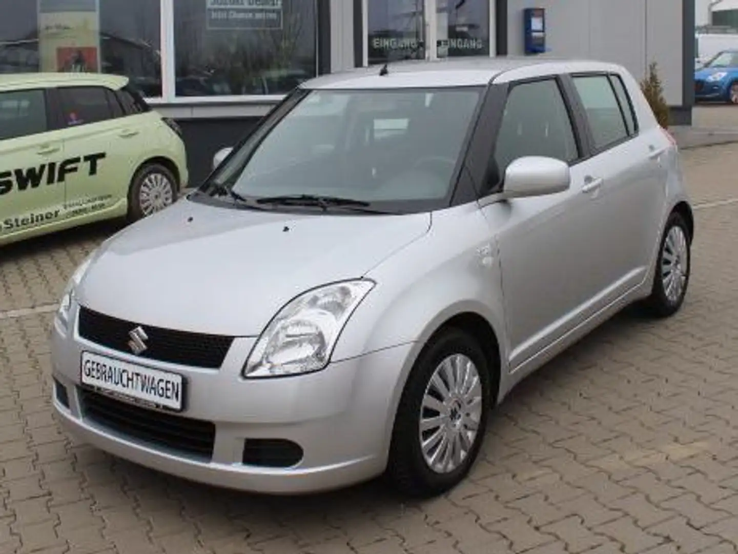 Suzuki Swift 1.3 Comfort Silver - 1