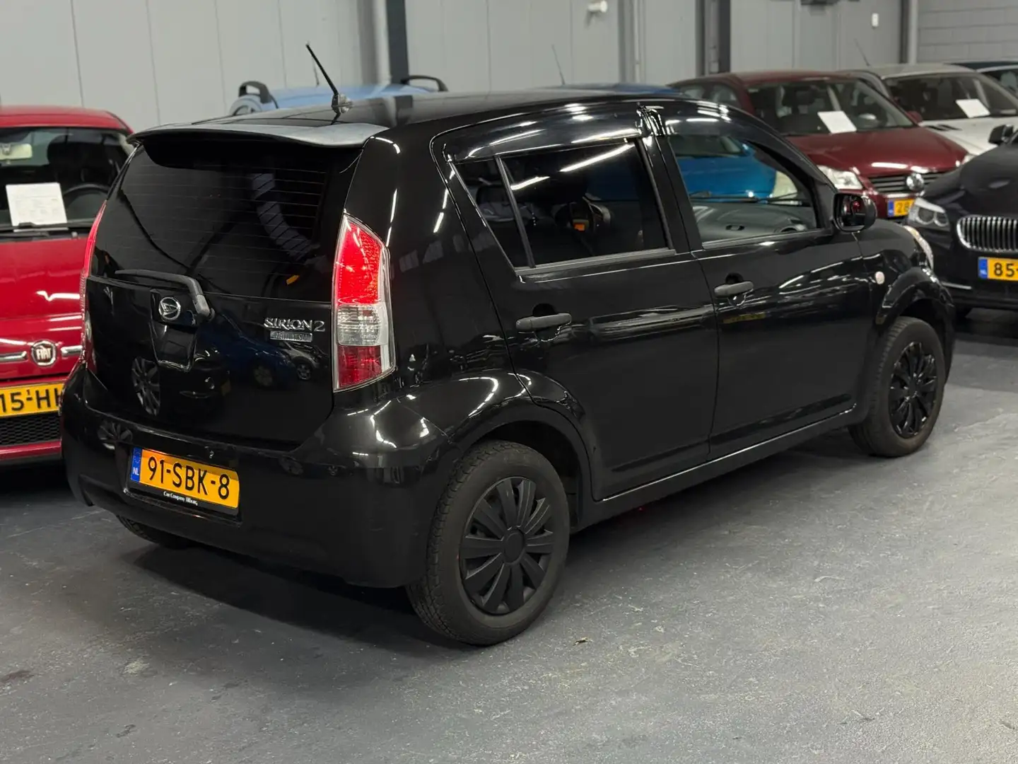 Daihatsu Sirion 2 1.0-12V Slim APK NAP Negro - 2