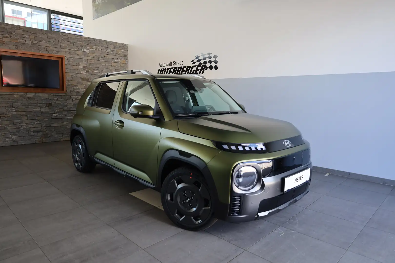 Hyundai Inster Cross Line 49kWh abzgl. möglicher Superbonus €4.00 Grün - 1