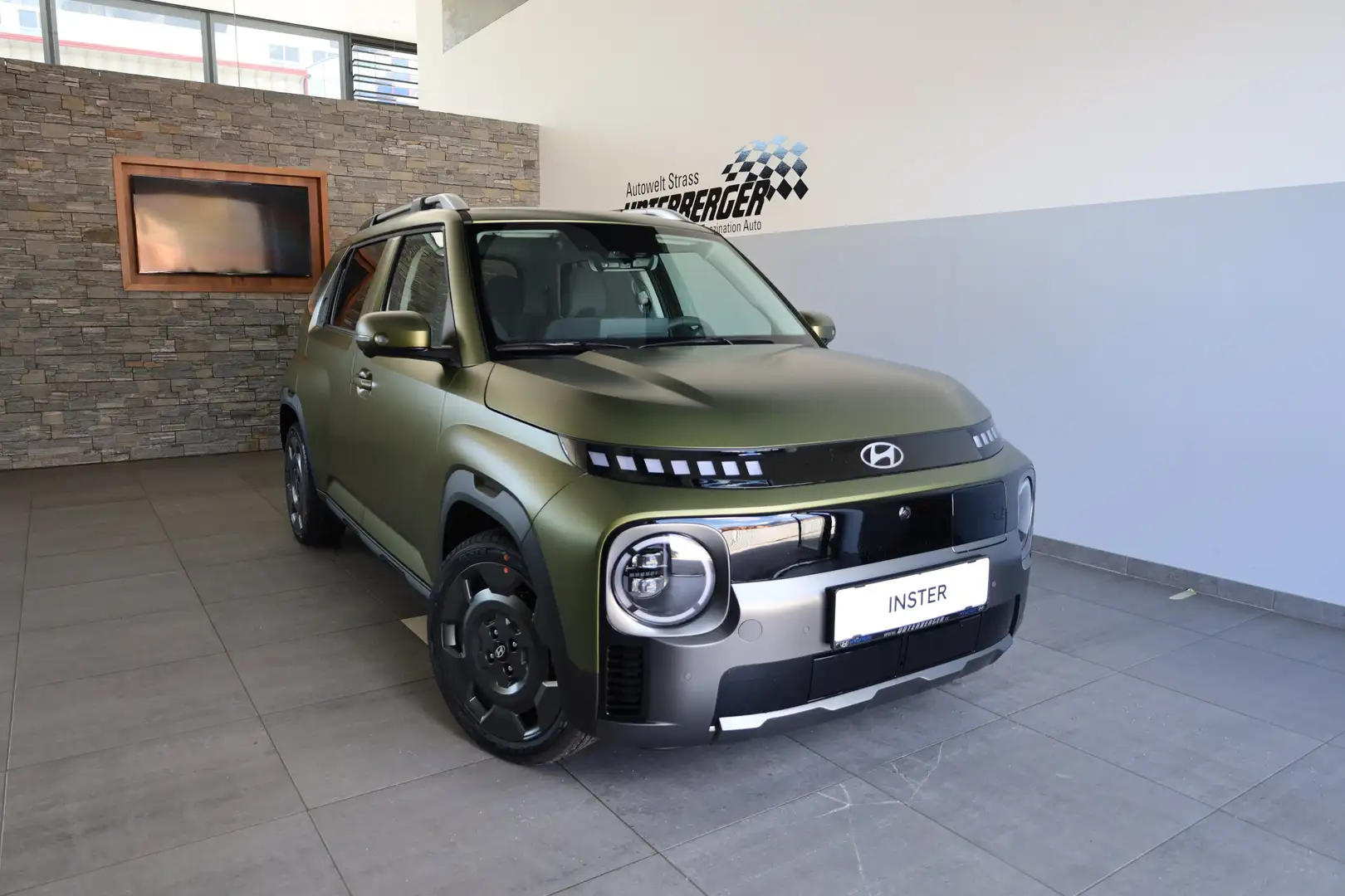 Hyundai Inster Cross Line 49kWh abzgl. möglicher Superbonus €4.00 Grün - 2