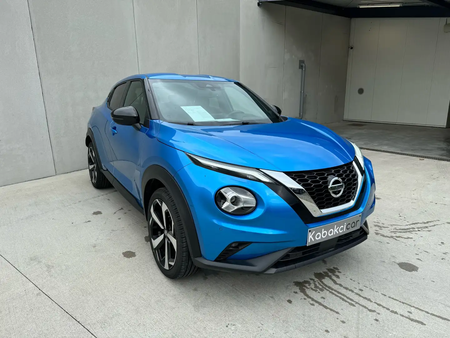 Nissan Juke 1.0 DIG-T 2WD Tekna (EU6AP) // GARANTIE 12 MOIS // Bleu - 1