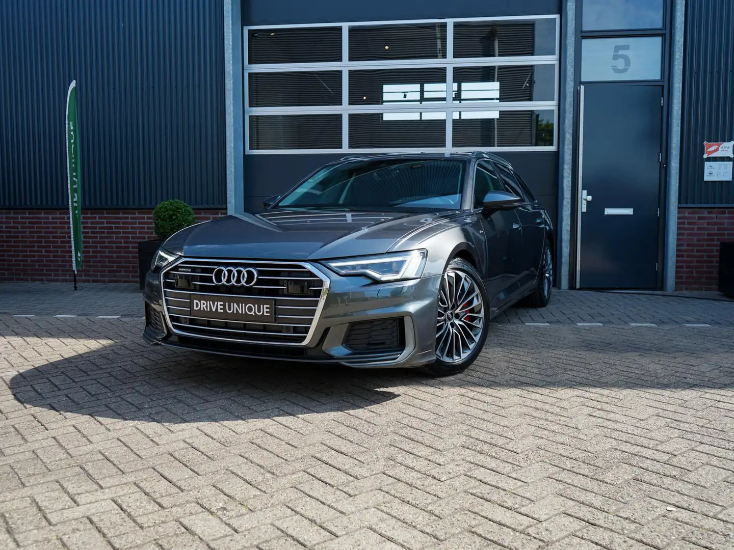 Audi A6 Avant 55 TFSI e quattro Competition | Bang & Olufs Grijs - 1