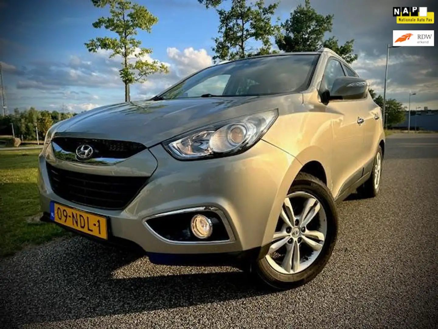 Hyundai iX35 2.0i Style, AIRCO, HALF LEER, DEALERONDERHOUDEN, H Grijs - 1