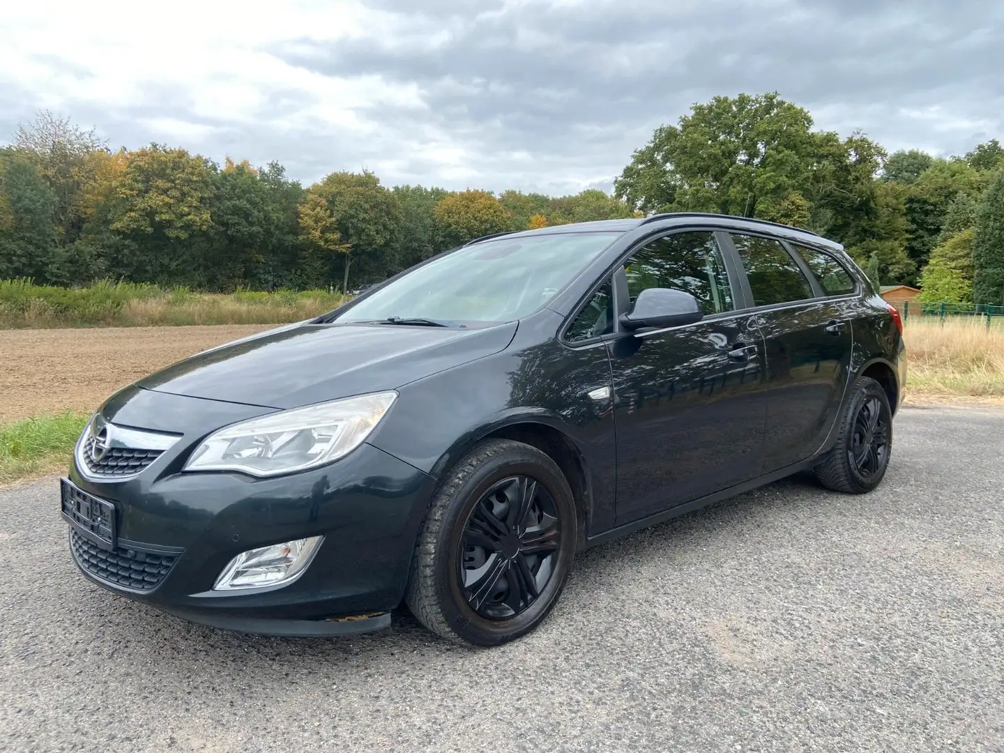 Opel Astra J 1.4 Sports Tourer Edition Klima PDC Zwart - 1
