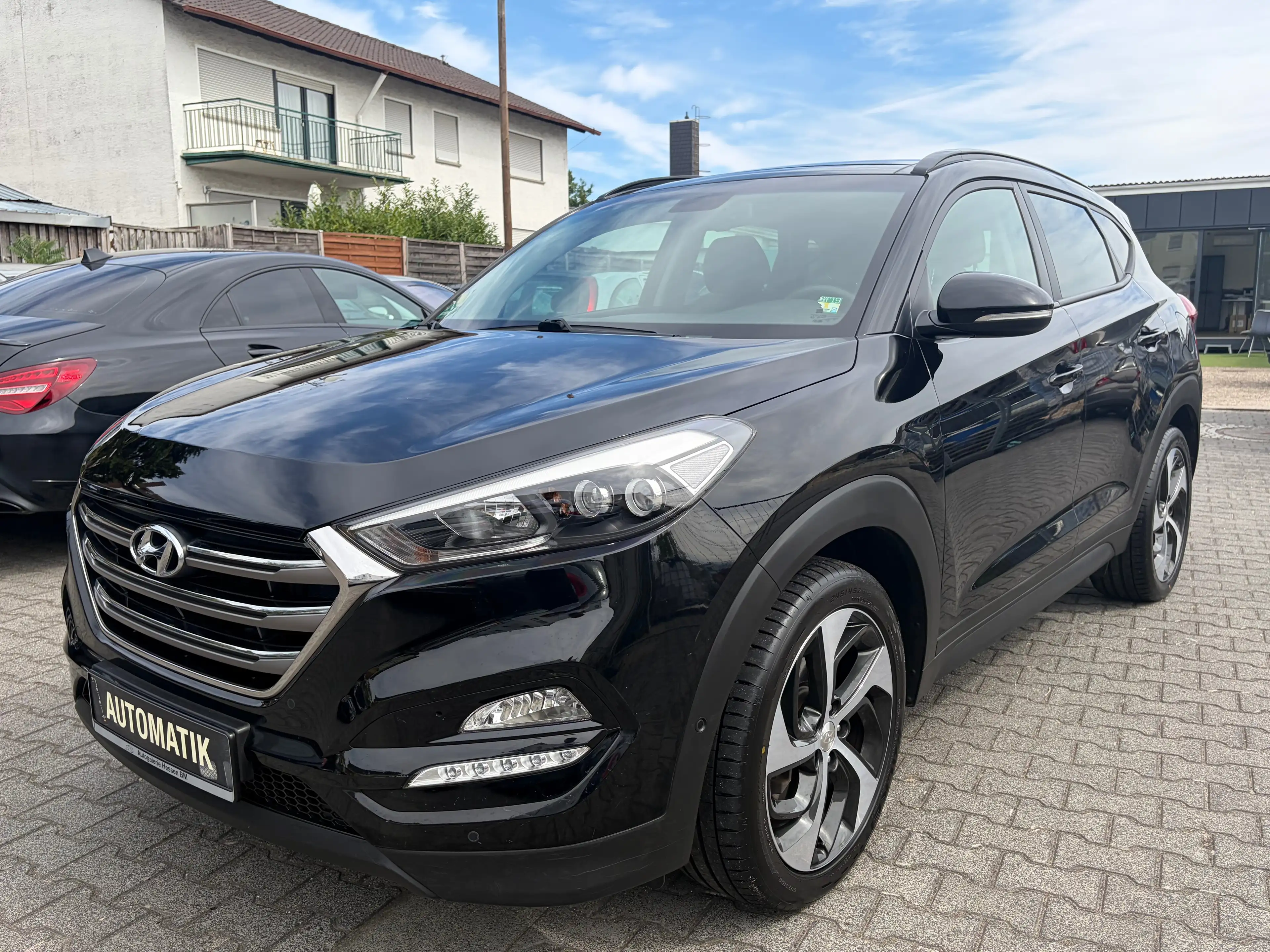 Hyundai TUCSON 4WD*Automatik*Kamera*SHZ*Temp.*2.Hand*Schiebe-Dach*Navi*PDC*BT