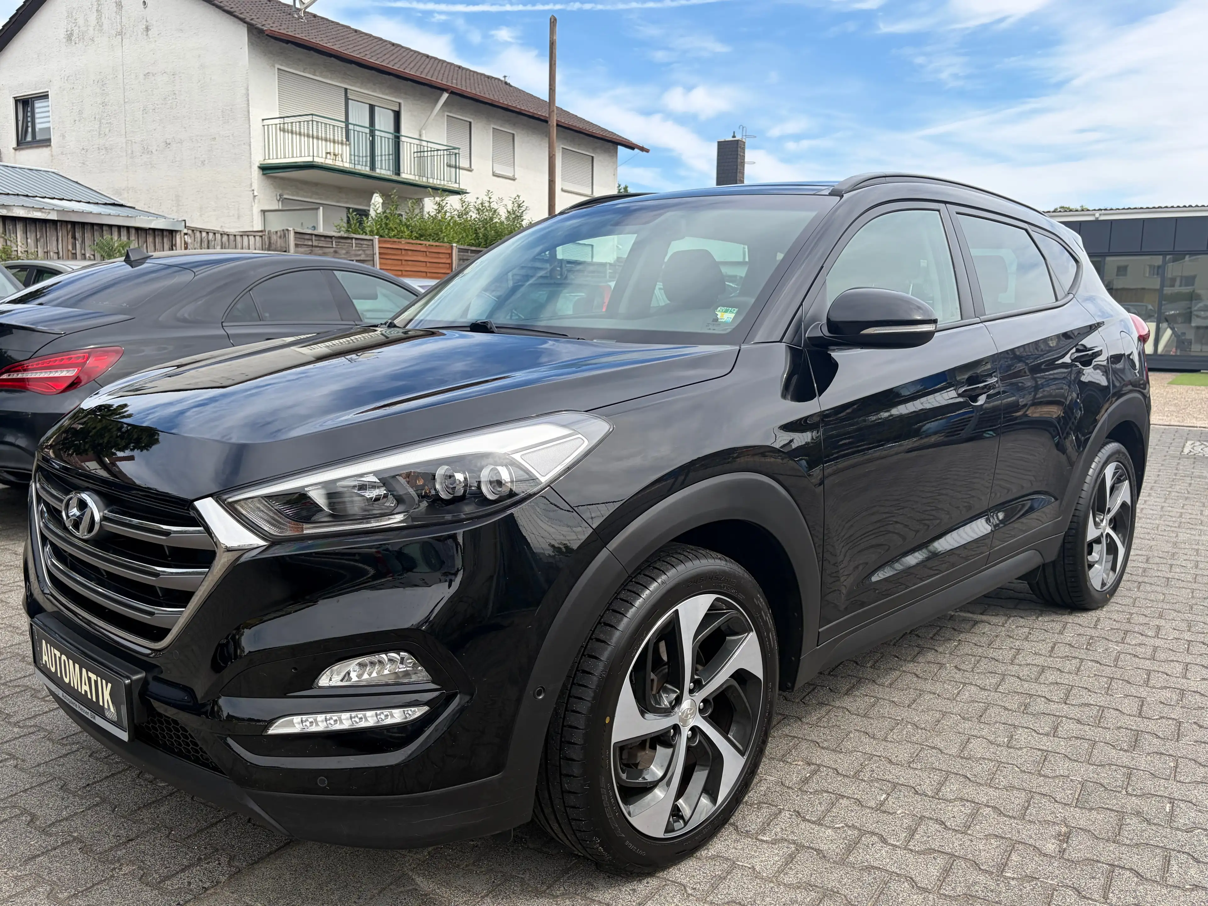 Hyundai TUCSON 4WD*Automatik*Kamera*SHZ*Temp.*2.Hand*Schiebe-Dach*Navi*PDC*BT — photo 2