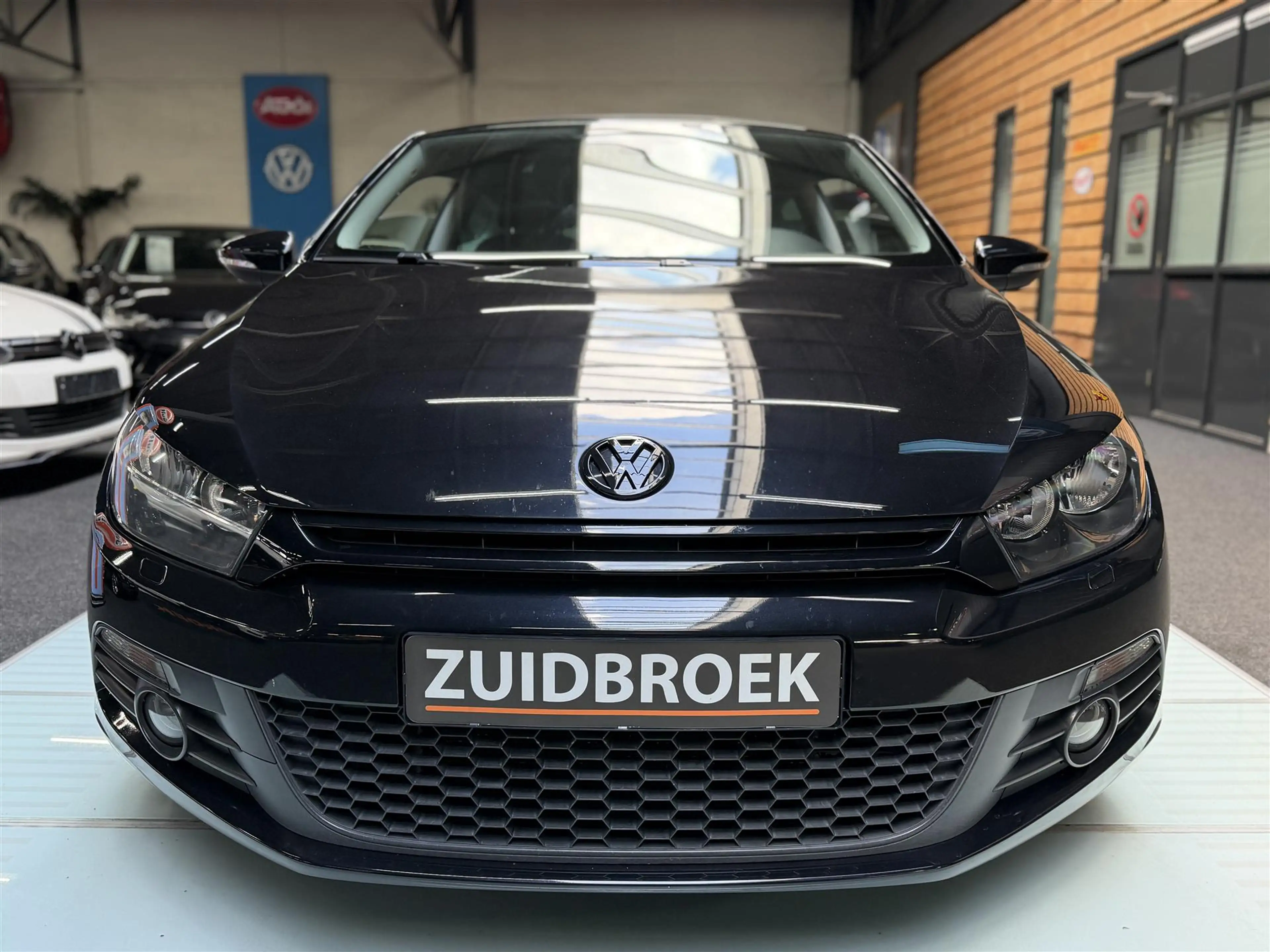 Volkswagen Scirocco 1.4 TSI Dak! Cruise! Navi! Clima! Maxton! — photo 2