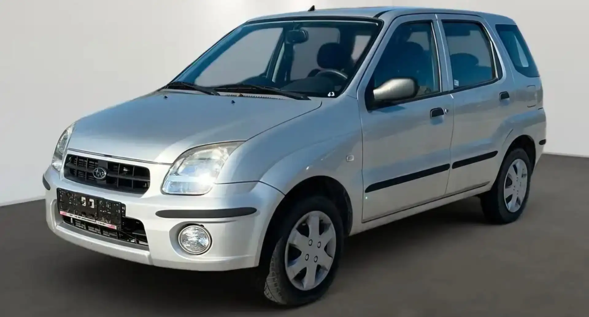 Suzuki Ignis Subaru Justy 1.3 4x4 - Airco + Keuring - Garantie Argent - 1