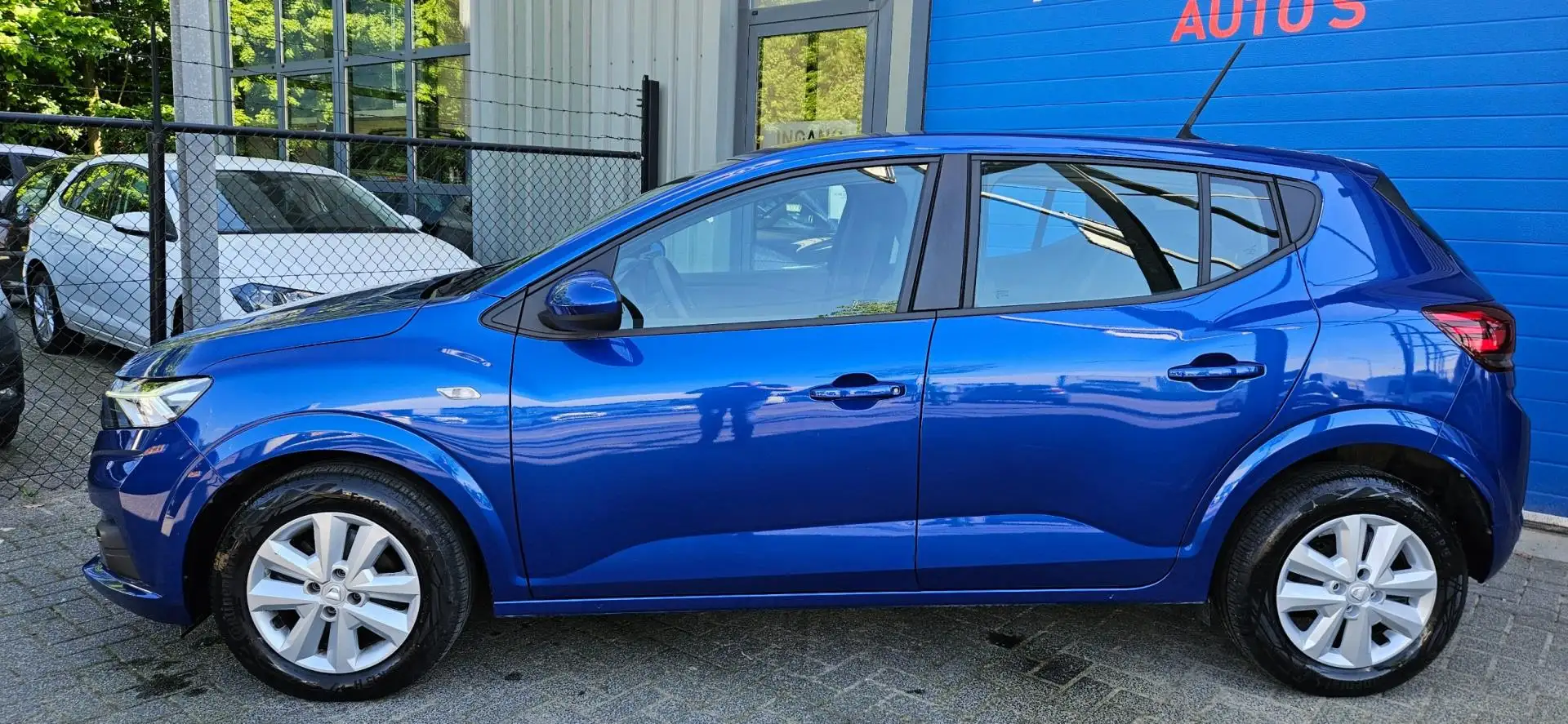 Dacia Sandero 1.0 67PK 5Drs Airco Cruise Bleutooth Led verlichti Blau - 2