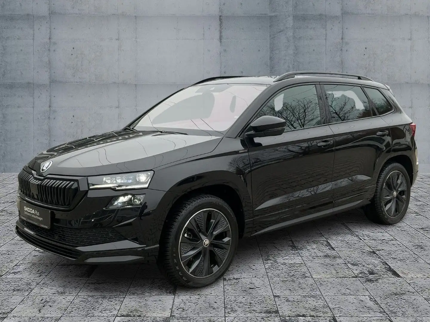 Skoda Karoq 2.0 TSI 4x4 DSG SPORTLINE MATRIX+AHK+PANO Zwart - 2