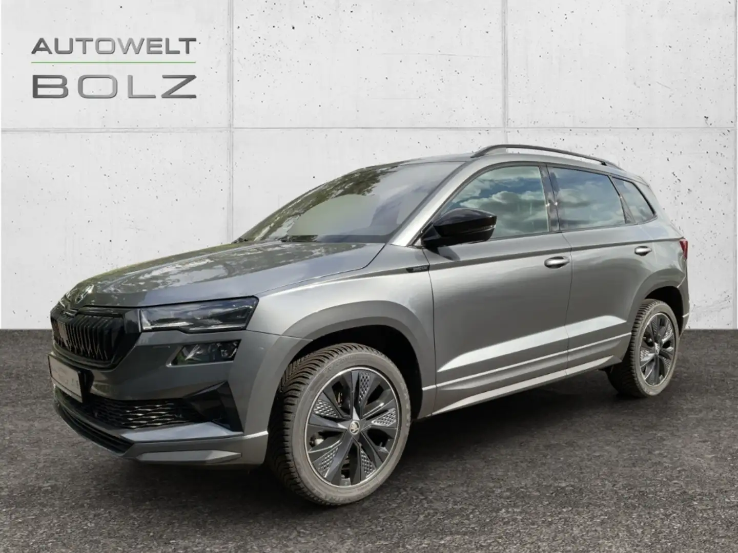 Skoda Karoq Sportline 1.5 TSI Pano Navi Leder Kamera Memory Si Grau - 1