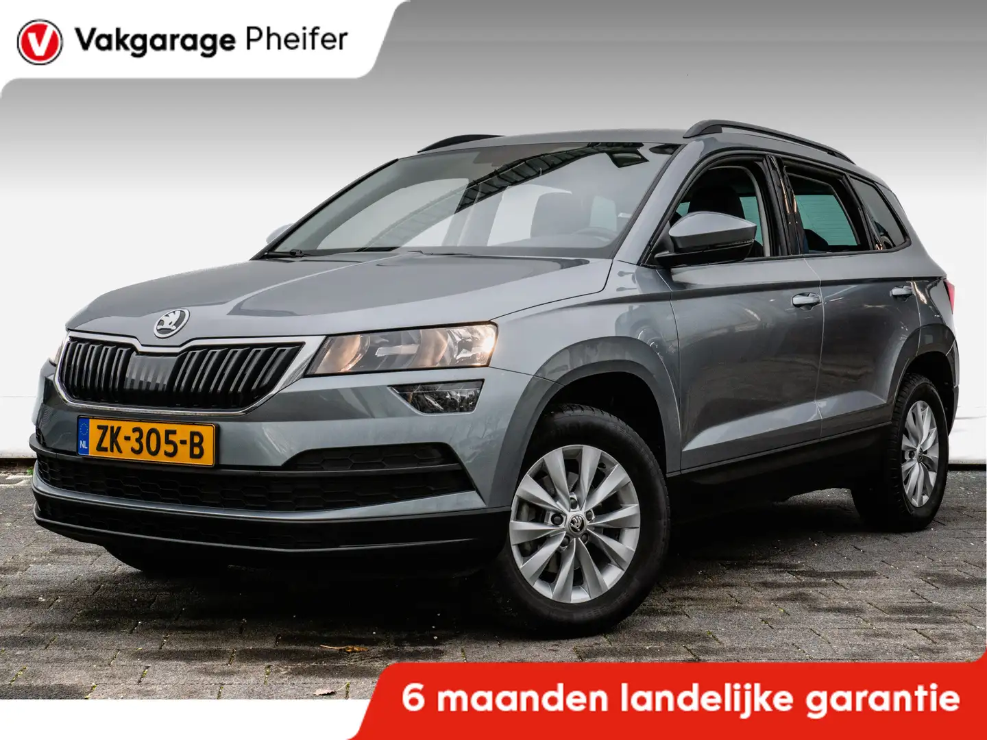 Skoda Karoq 1.0 TSI 115pk Ambition Trekhaak/ Navigatie/ Cruise Gris - 1