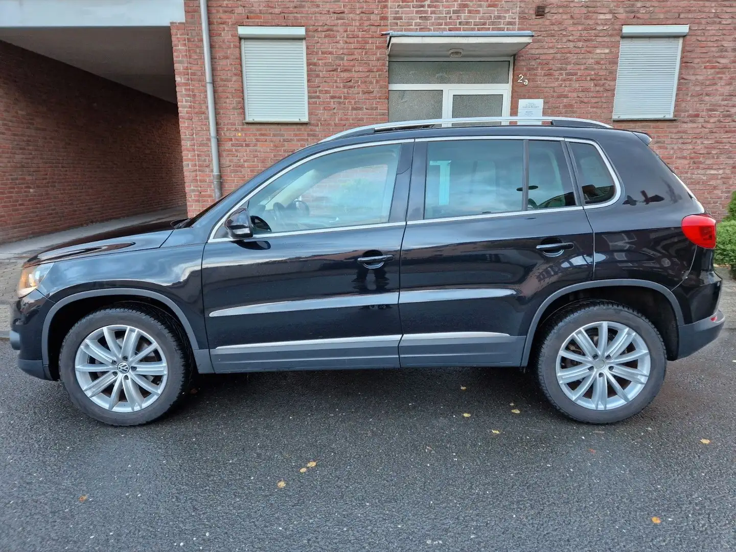 Volkswagen Tiguan 2.0 TSI Premium/3Jahre Garantie inklusive/Gepflegt Zwart - 1
