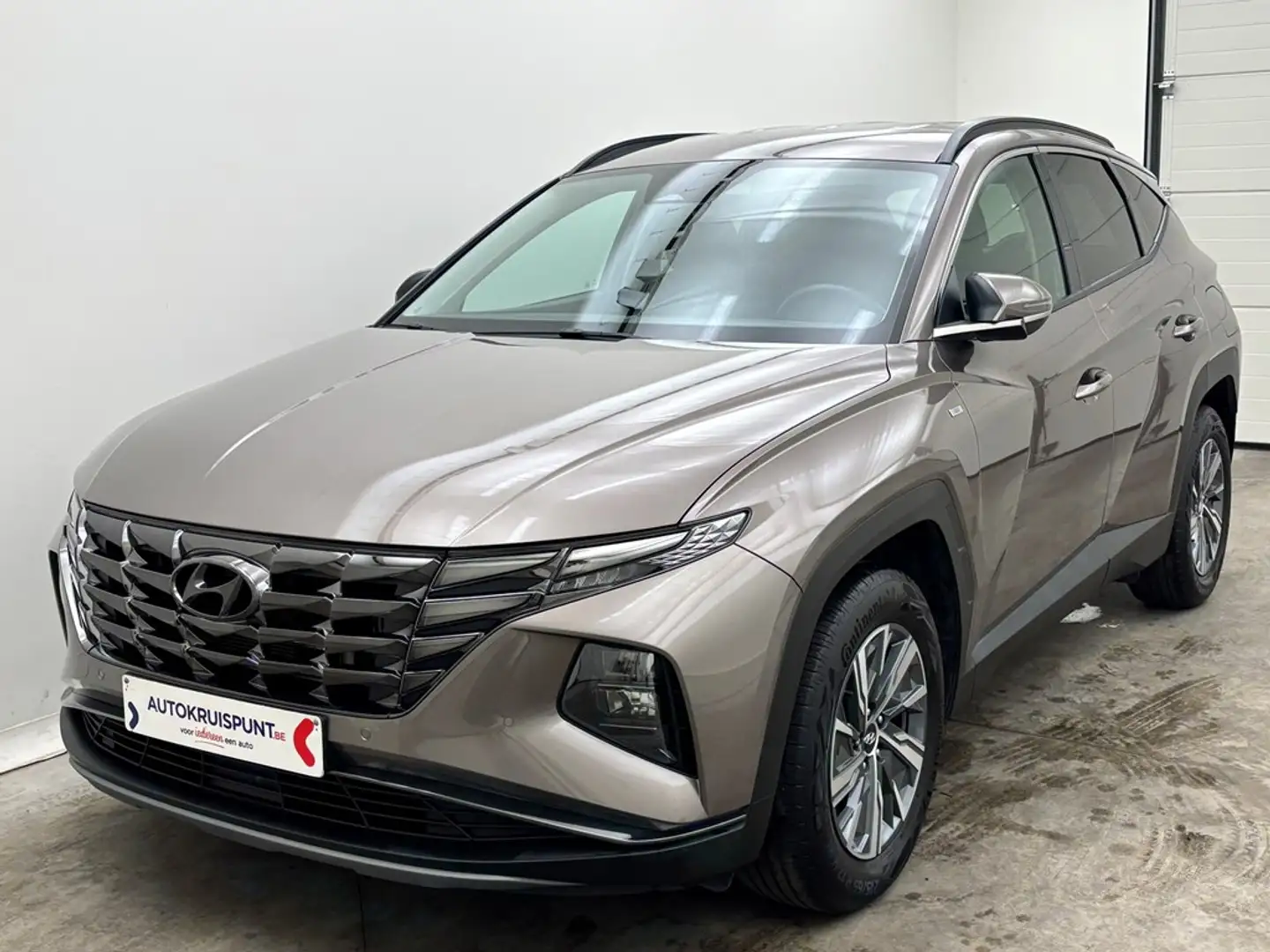 Hyundai TUCSON 1.6T-GDi Feel 48v 7DCT GPS Camera Dig.Airco Alu Le Bronzo - 1