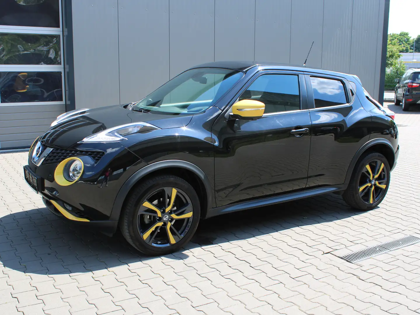 Nissan Juke 1.2 DIG-T Tekna 360°Kamera/Navi/SHZ/DAB/Velour Schwarz - 1