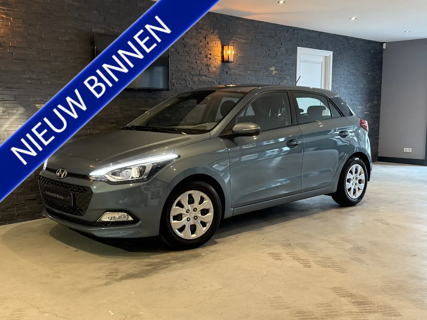 Hyundai i20 1.2 benzine Bj: 2016 / 15.750 KM Grijs - 1