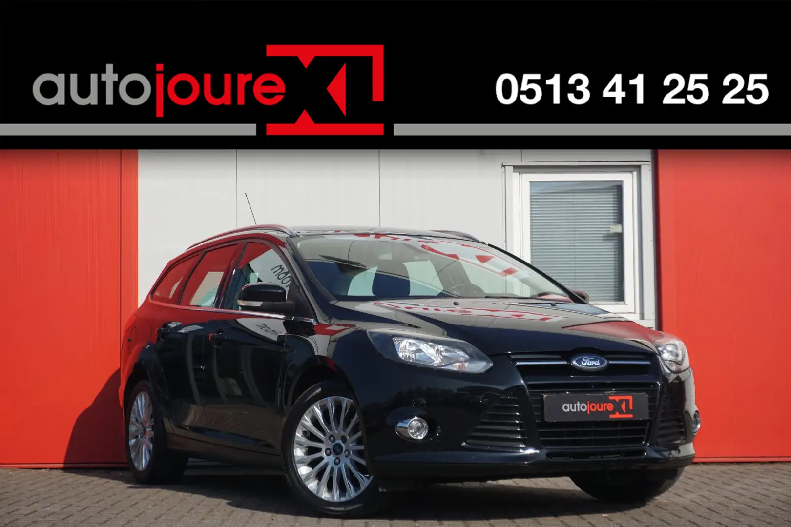 Ford Focus Wagon 1.6 TI-VCT First Edition | Navigatie | Cruis Noir - 1