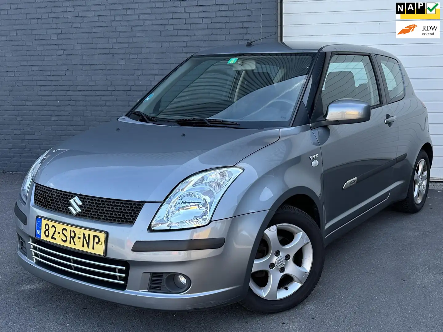 Suzuki Swift 1.5 Exclusive APK-24-2-26/AIRCO/LMVBLUETOOTH/KEYLE Grijs - 1