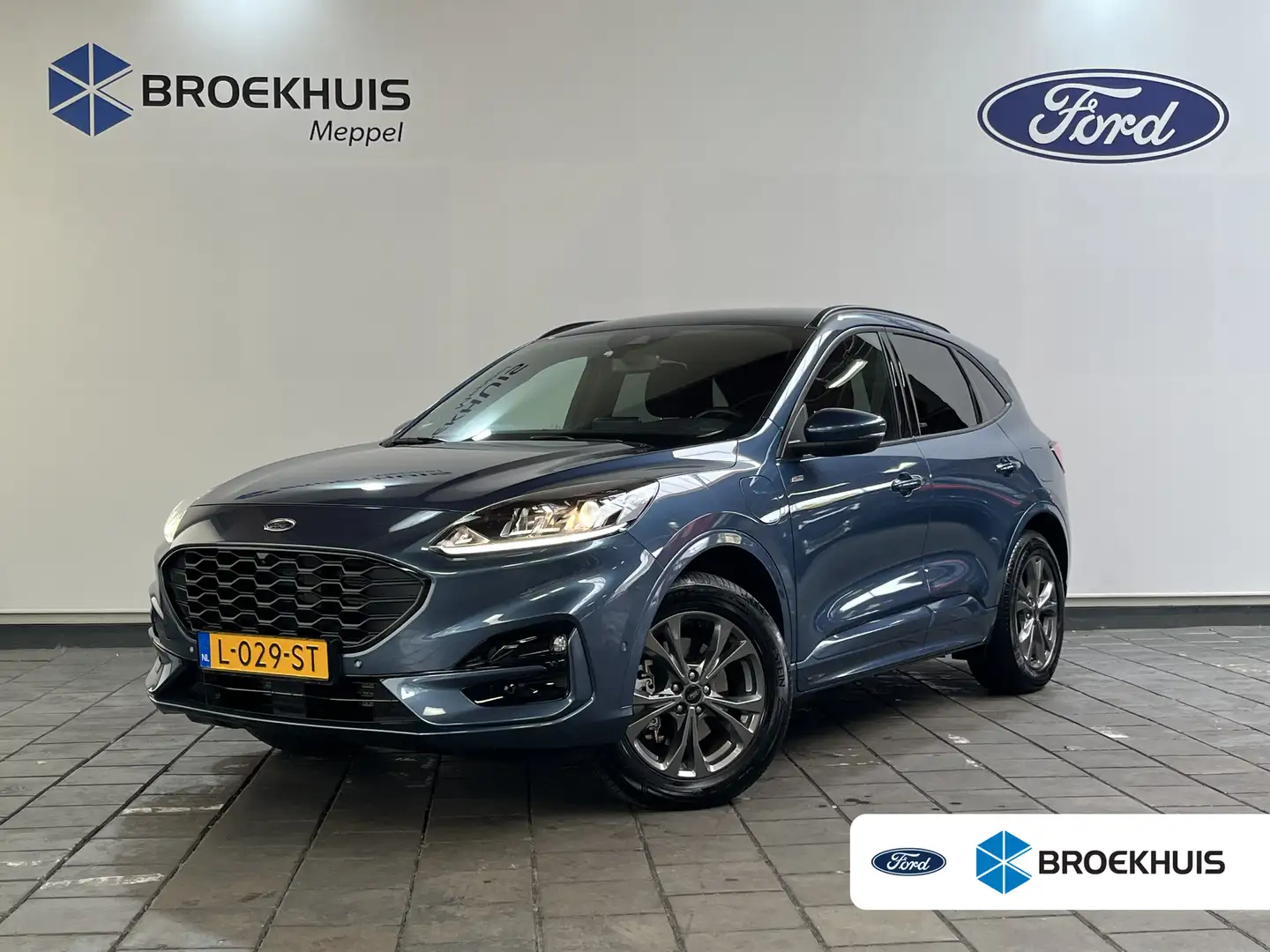 Ford Kuga 2.5 PHEV ST-Line | Winter Pakket | Adaptive cruise Blauw - 1