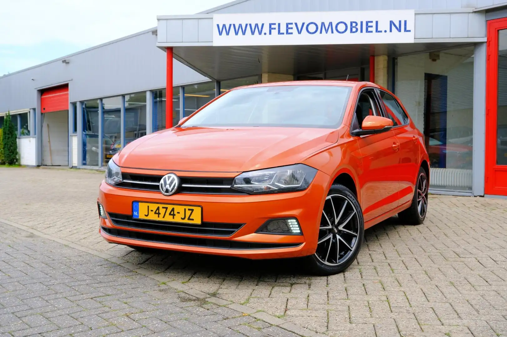 Volkswagen Polo 1.0 TSI Comfortline Business Airco|Cruise|LMV Orange - 1