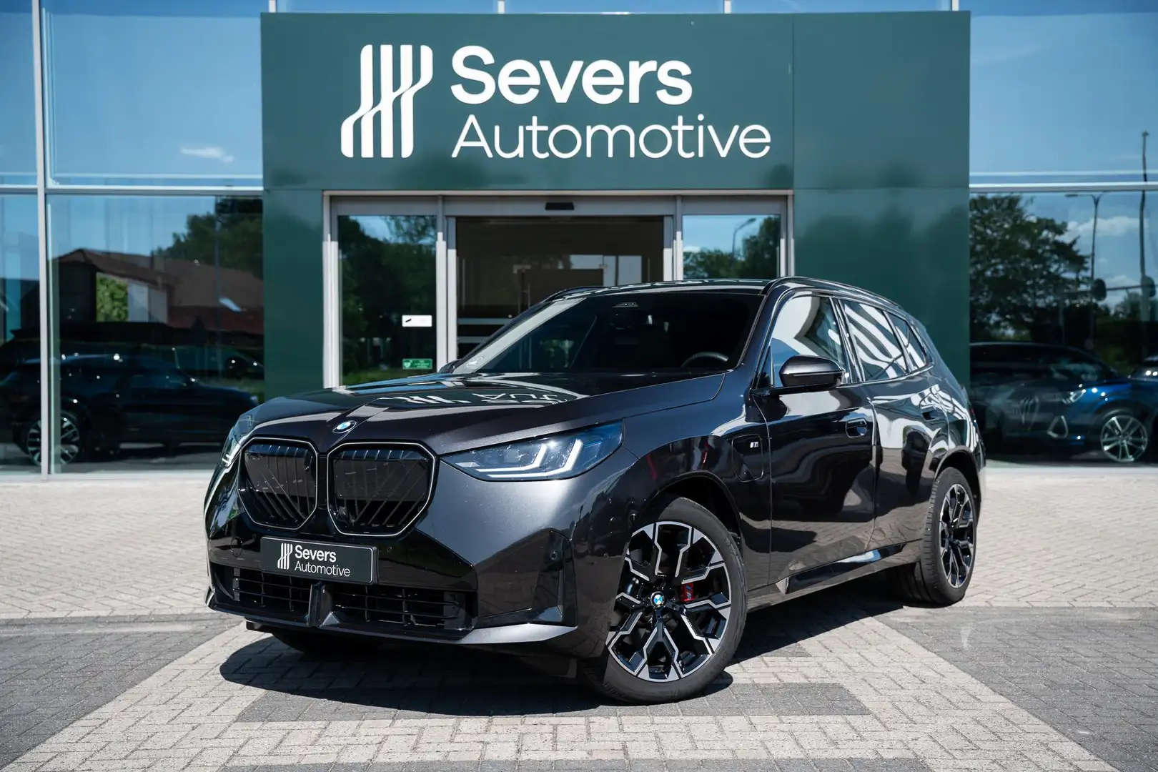 BMW X3 30e xDrive | Panoramadak | M Sportpakket Pro | Har Grijs - 1