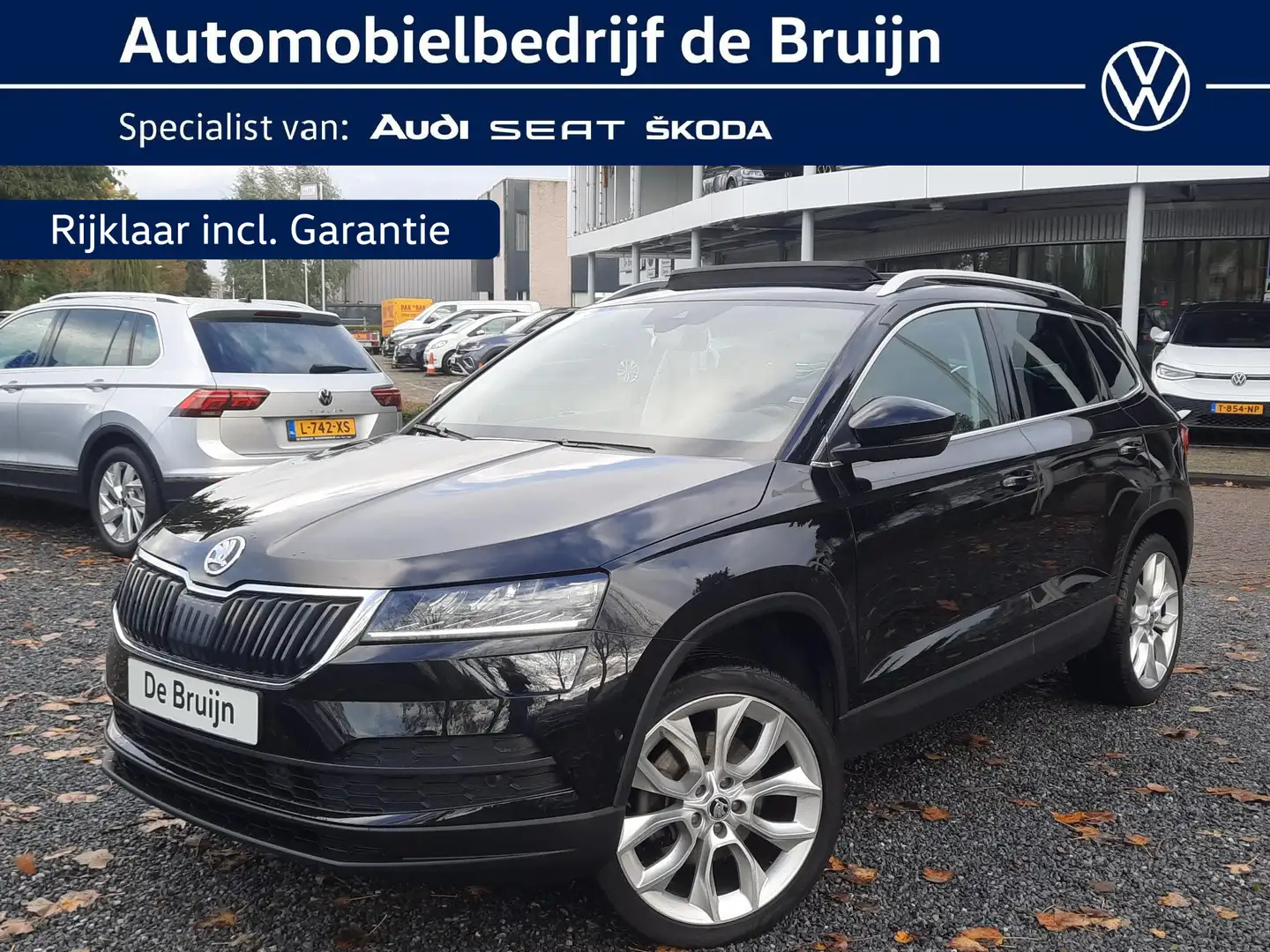 Skoda Karoq 1.5 TSI 150pk DSG Style (Pano,Trekhaak,Camera,Cant Noir - 1