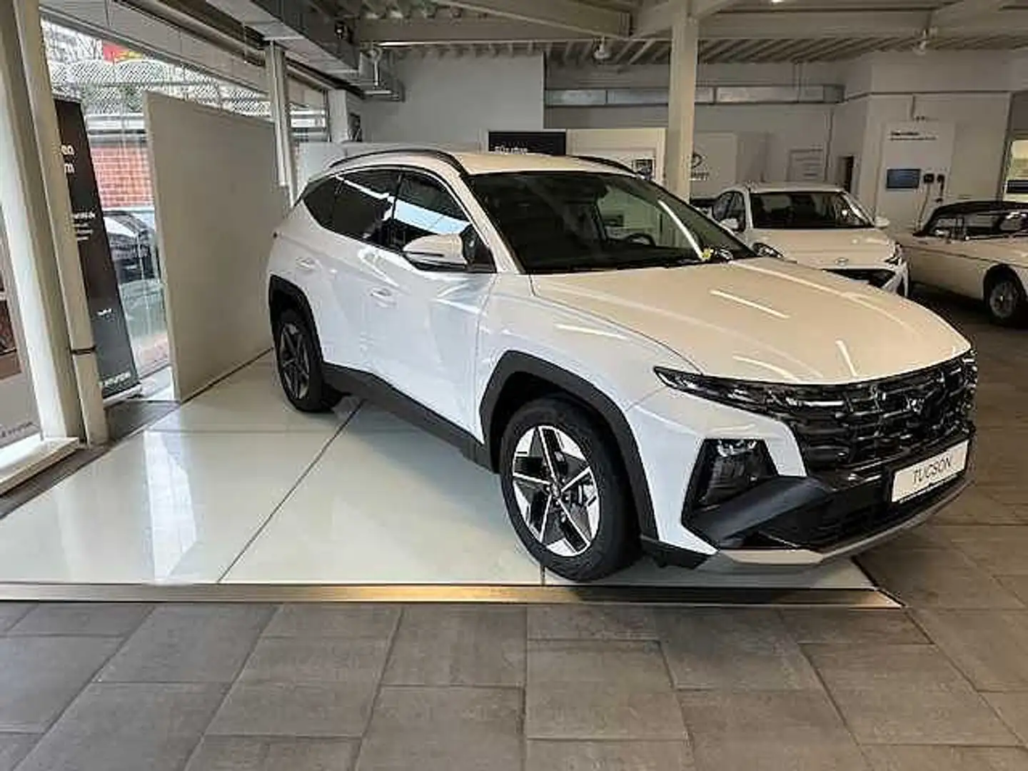 Hyundai TUCSON 1.6 T-GDi 48V-Hybrid 4WD DCT Comfort*Navi*LED Weiß - 1
