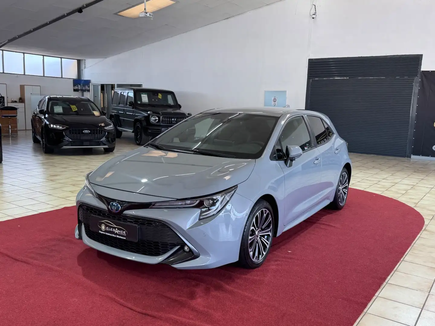 Toyota Corolla Hybrid Team D Grau - 1