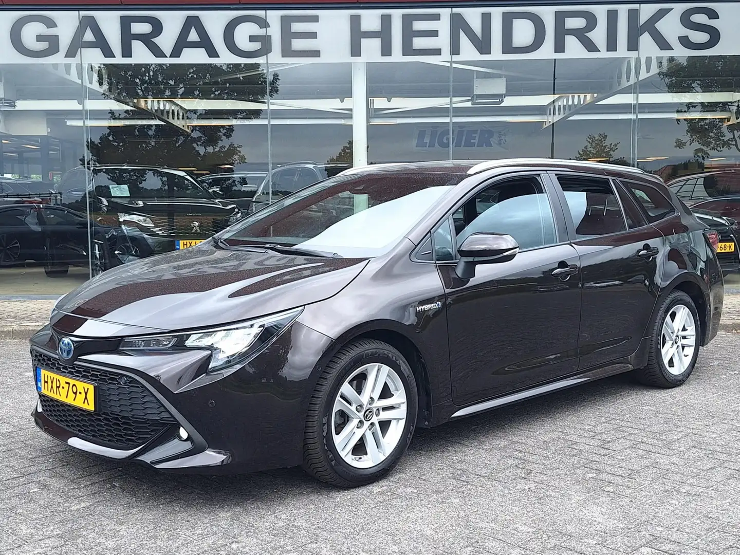 Toyota Corolla Touring Sports 1.8 Hybrid Active | Navi | Full LED Brun - 1