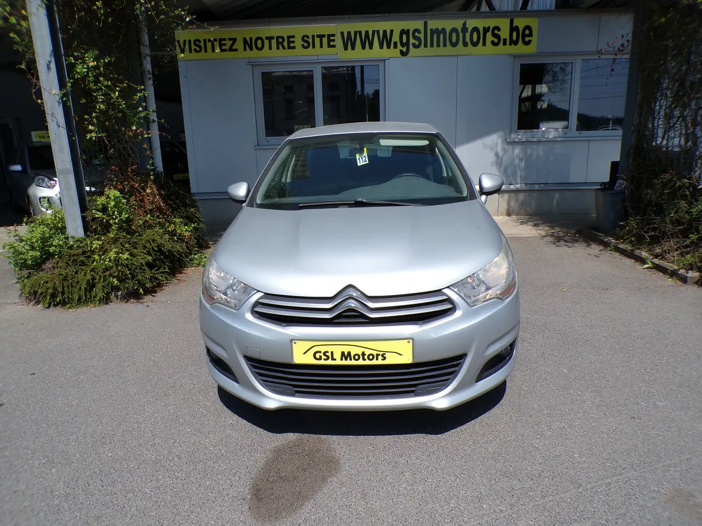 Citroen C4 1.4i 95cv 5portes gris 03/12 97644km Clim Radio CD Grijs - 2