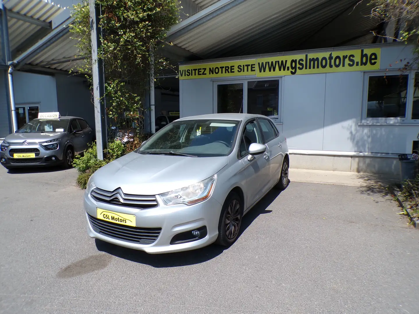 Citroen C4 1.4i 95cv 5portes gris 03/12 97644km Clim Radio CD Grijs - 1