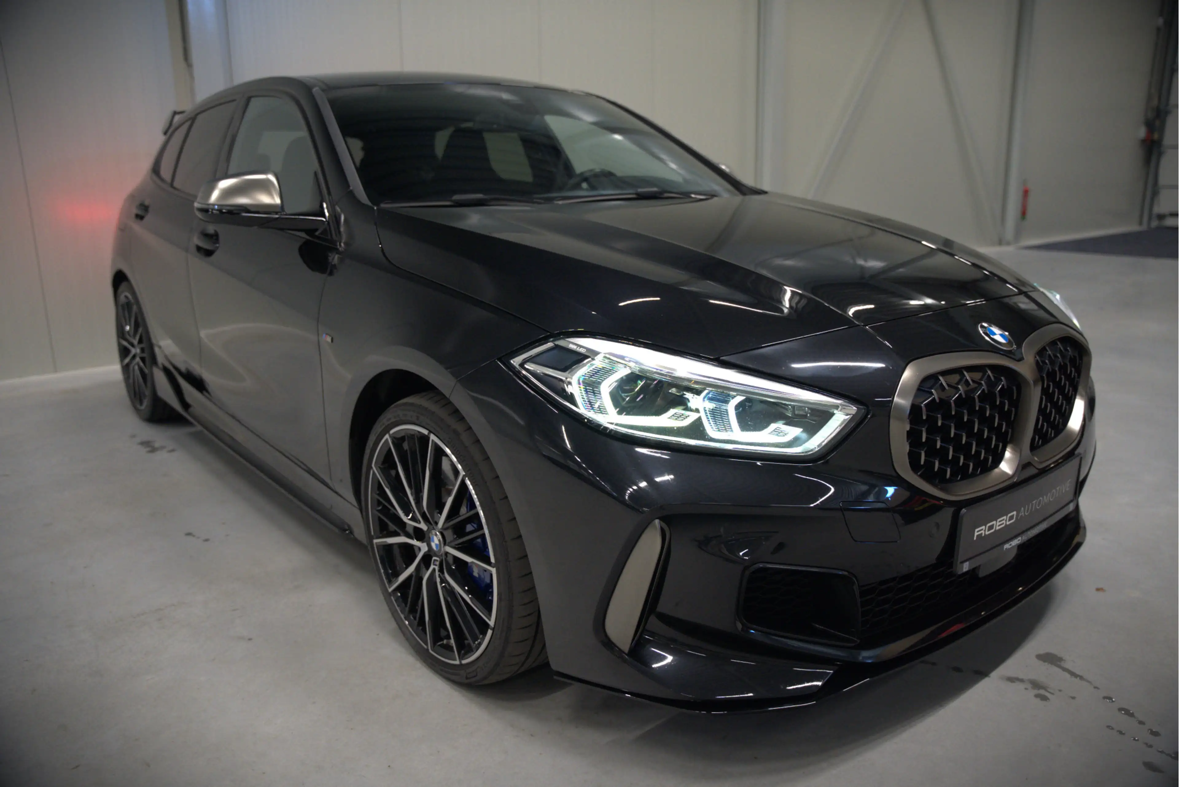 BMW 135 1-serie M135i xDrive High Executive Edition — photo 14