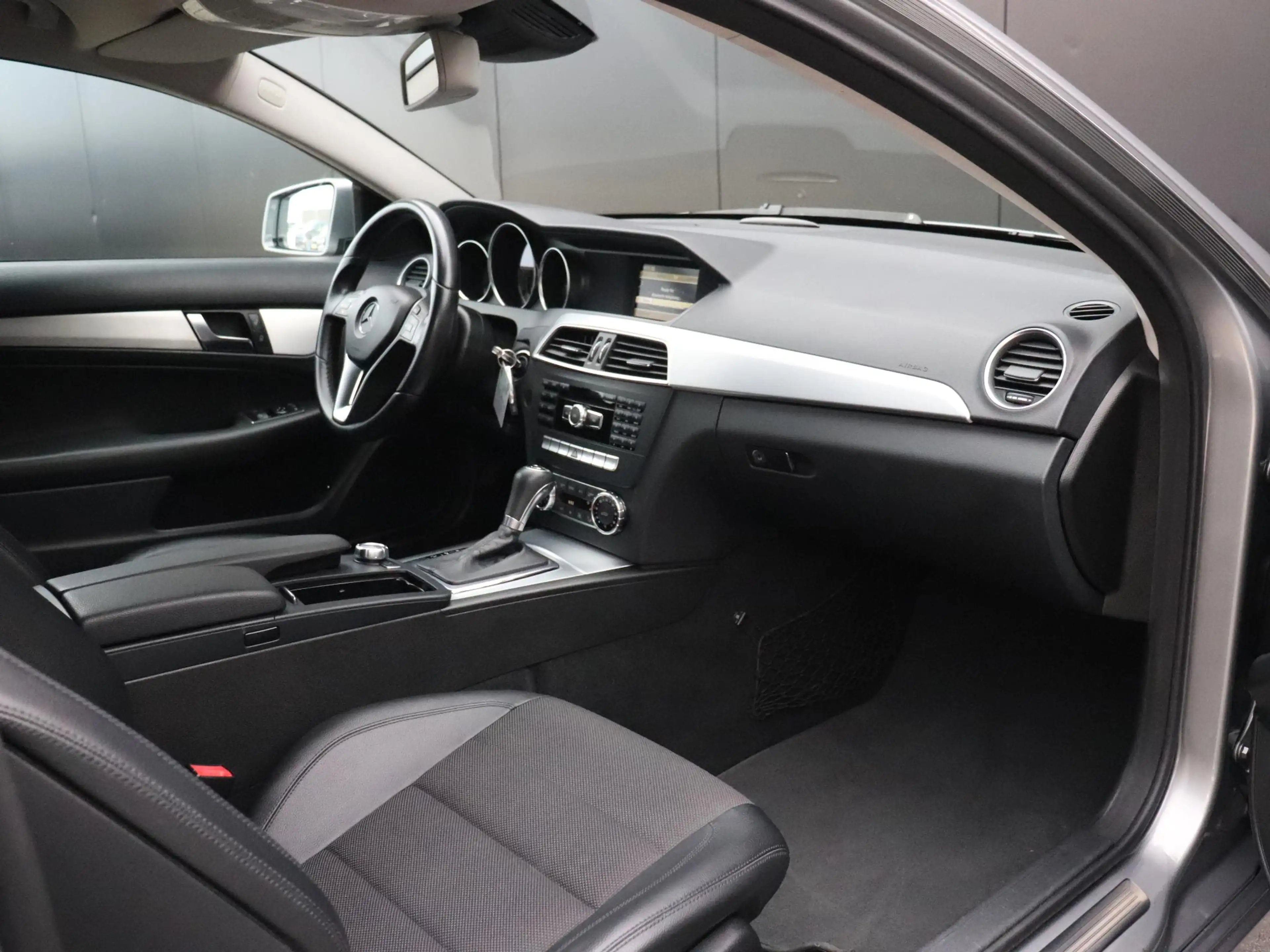 Mercedes-Benz C 180 Coupé | HALF LEDER | PDC | STOELVERW. | CRUISE | — photo 15