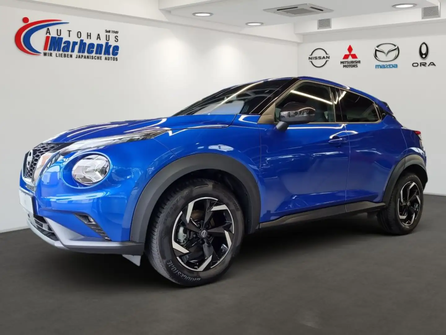 Nissan Juke 1.0 DIG-T N-Connecta Blauw - 1