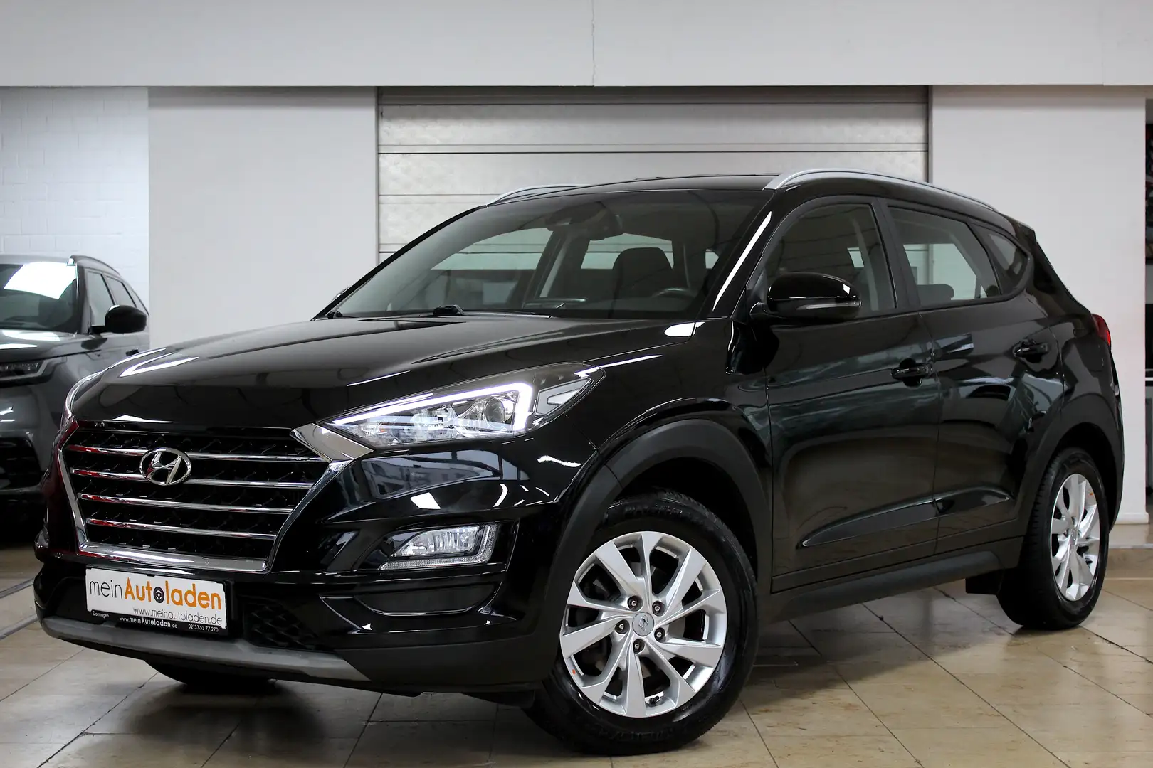 Hyundai TUCSON 1.6 T-GDI Automatik *NAVI*AHK*LED*KAMERA*KRELL* Zwart - 1