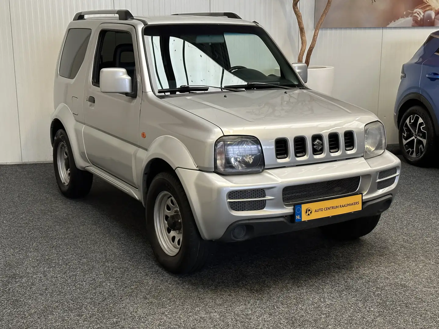 Suzuki Jimny 1.3 JX 4WD STOELVERWARMING RADIO/CD ELEKTRISCHE RA Grijs - 2
