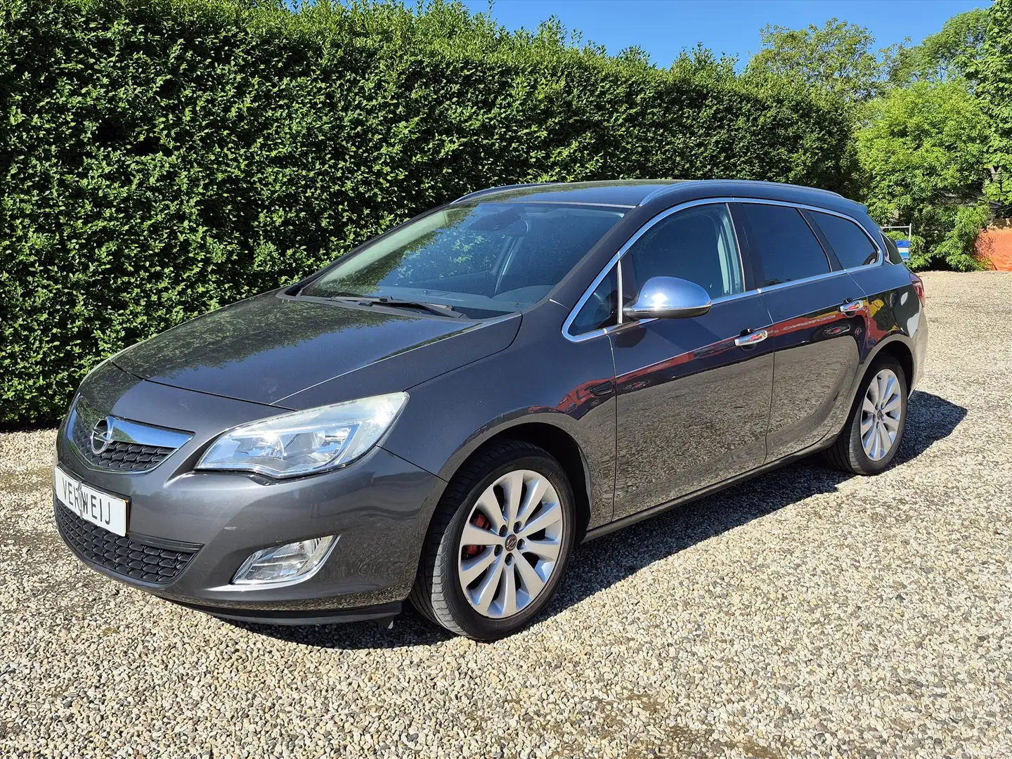 Opel Astra 1.4 Turbo Cosmo | Navi | Clima | Stoel- / Stuurver Grigio - 1