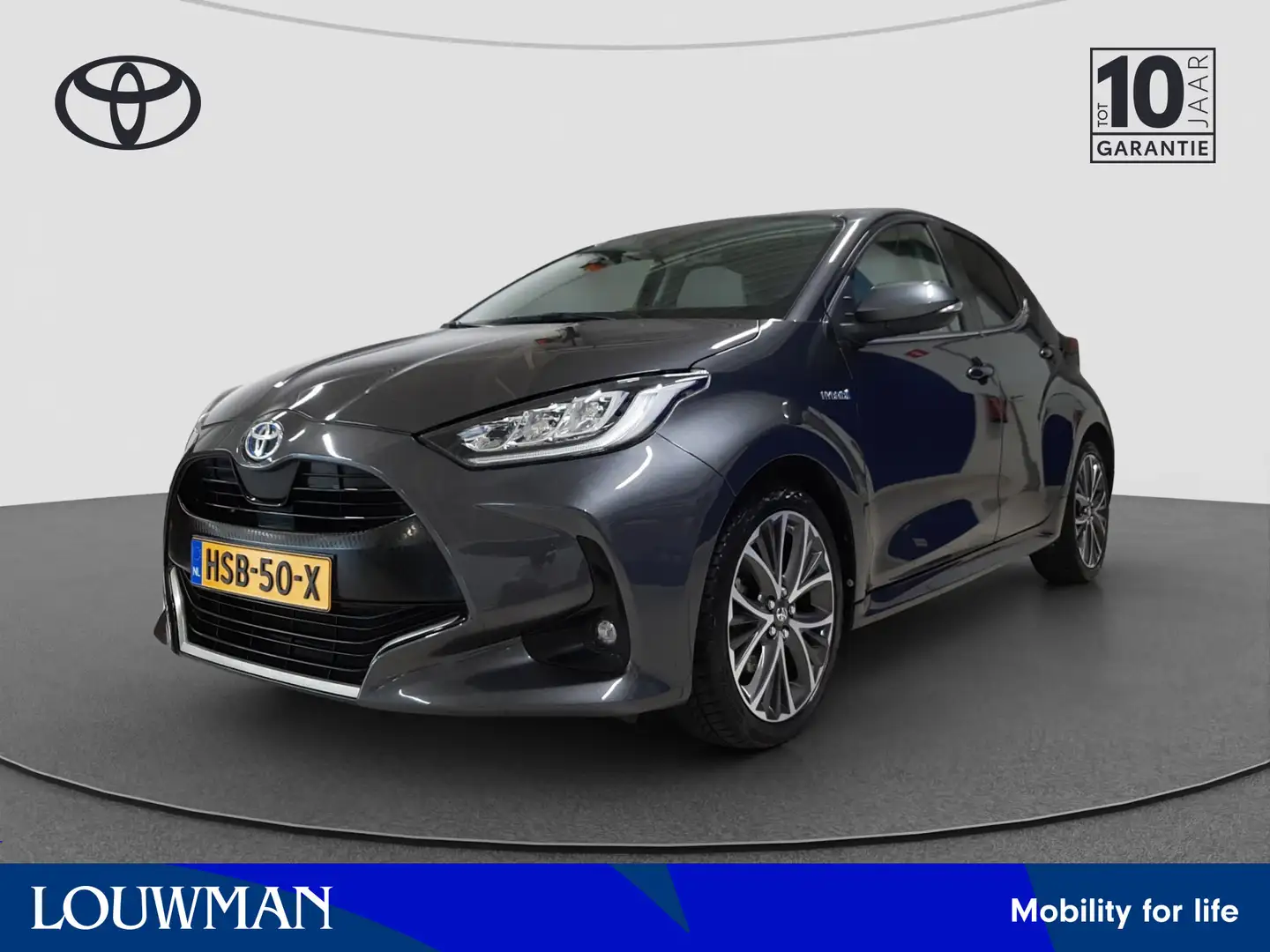 Toyota Yaris 1.5 Hybrid Executive Limited | Leder | Navigatie | Grijs - 1