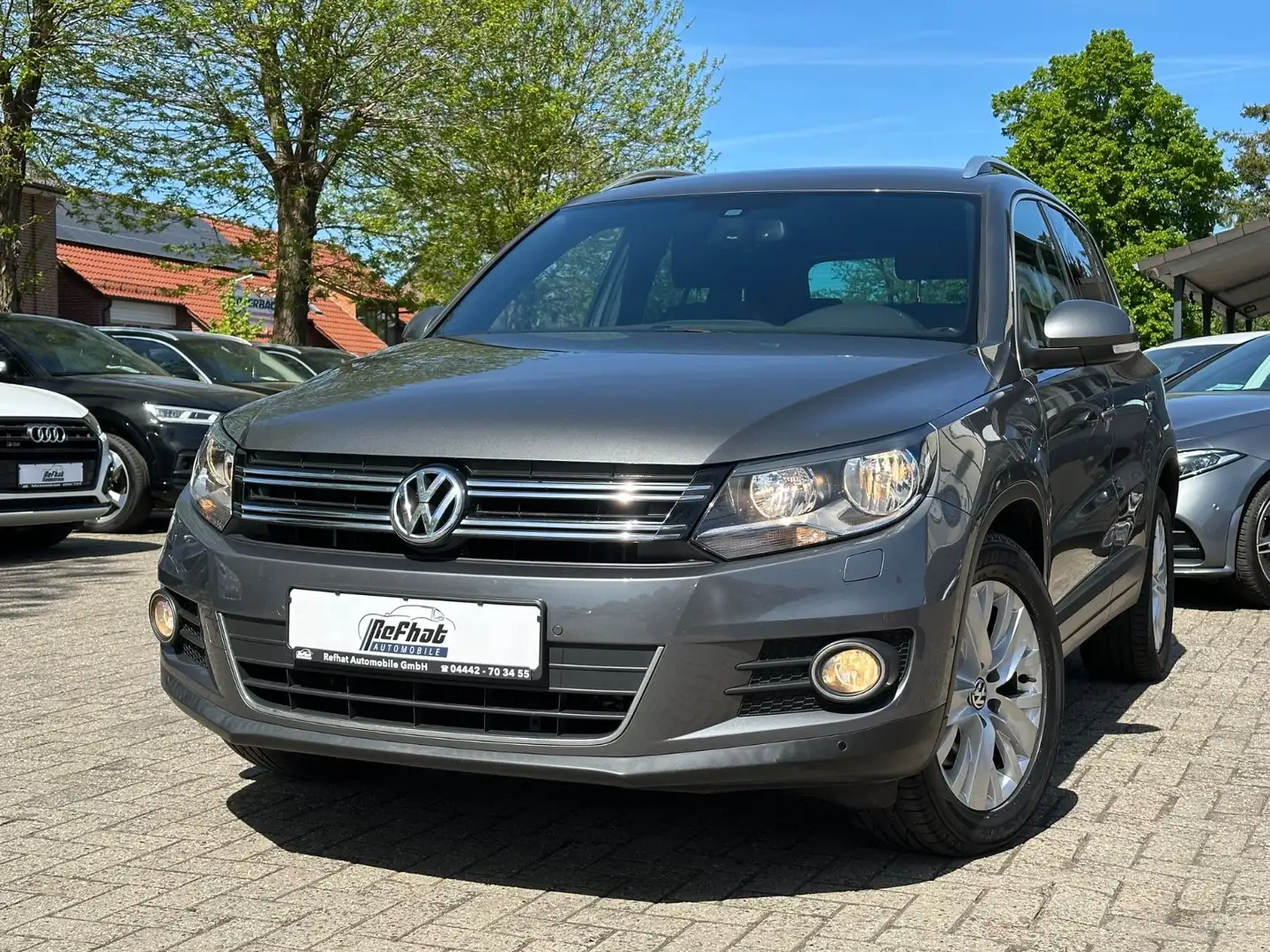 Volkswagen Tiguan Sport & Style BMT*PDC*MFKL*KLIMA*RADIO* Gris - 1