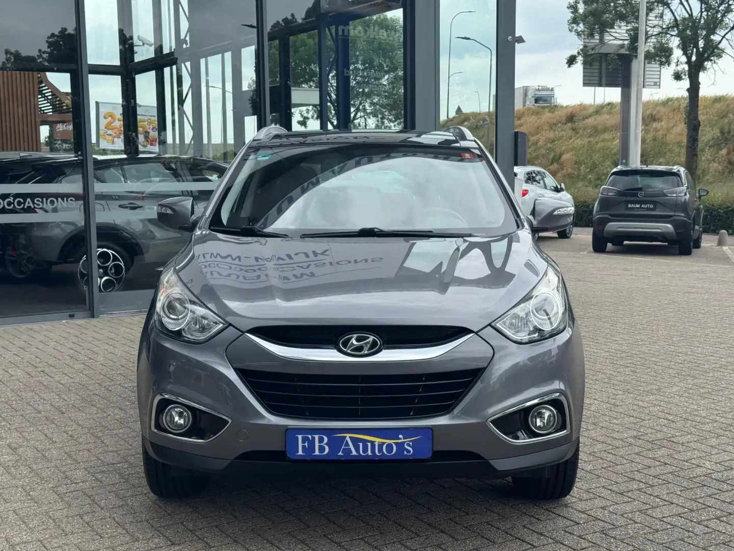 Hyundai iX35 1.6i GDI i-Light Airco Lmv Pano Grijs - 2