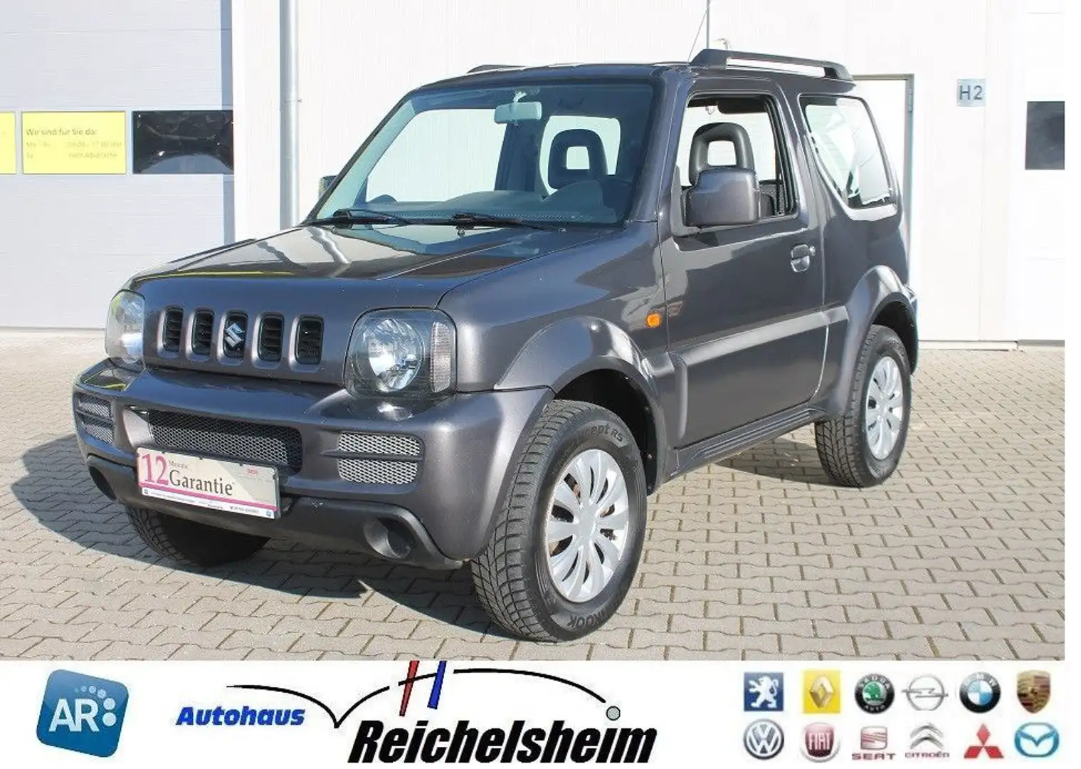 Suzuki Jimny Tüv/Au+Insp. neu,wenig Km,AHK,4x4,Finanz Grau - 1