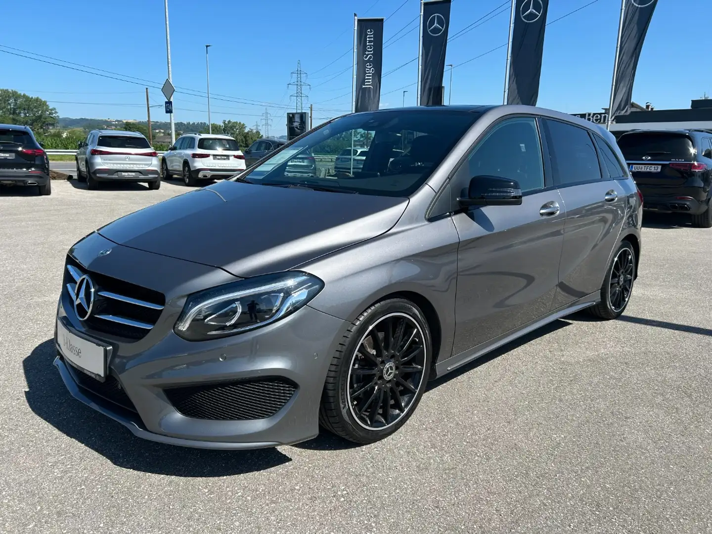 Mercedes-Benz B 200 d 4MATIC AMG Line AMG Pano Night PTS Shz Grijs - 1