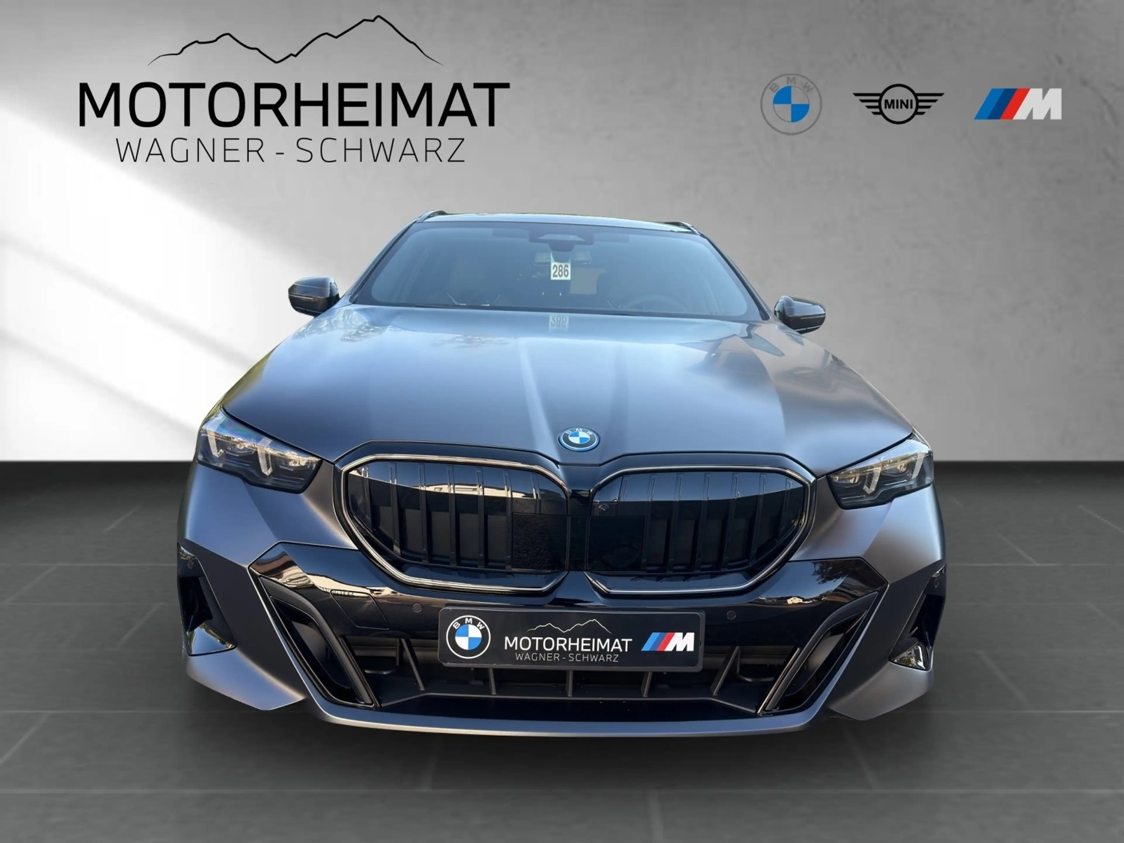 BMW 550 e xDrive Touring A — photo 3