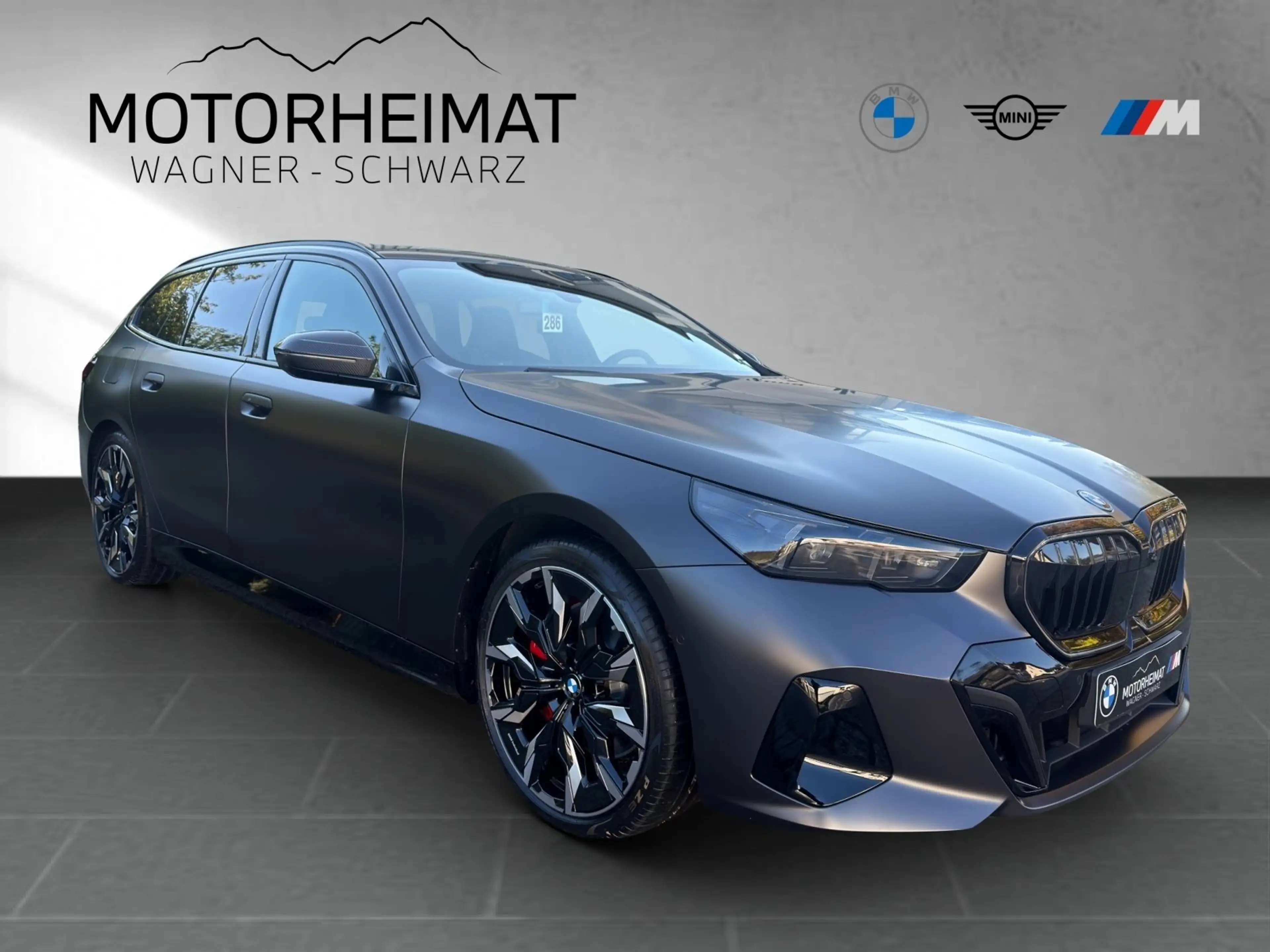 BMW 550 e xDrive Touring A — photo 4