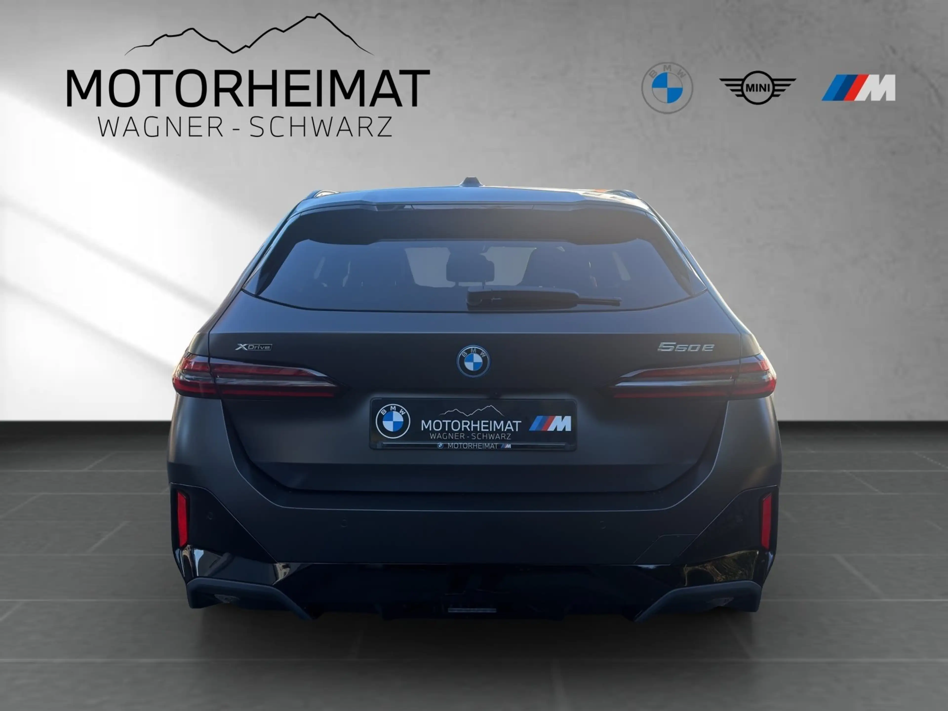 BMW 550 e xDrive Touring A — photo 6