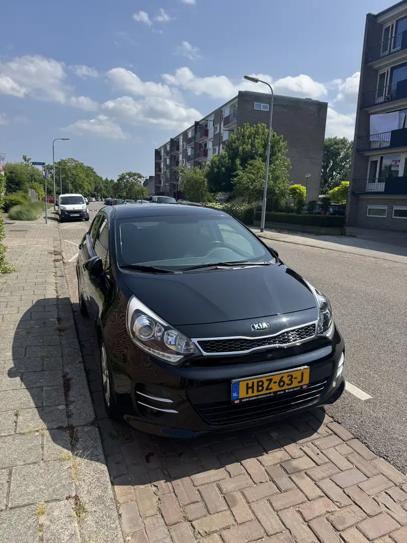 Kia Rio 1.2 CVVT DynamicL. Zwart - 1