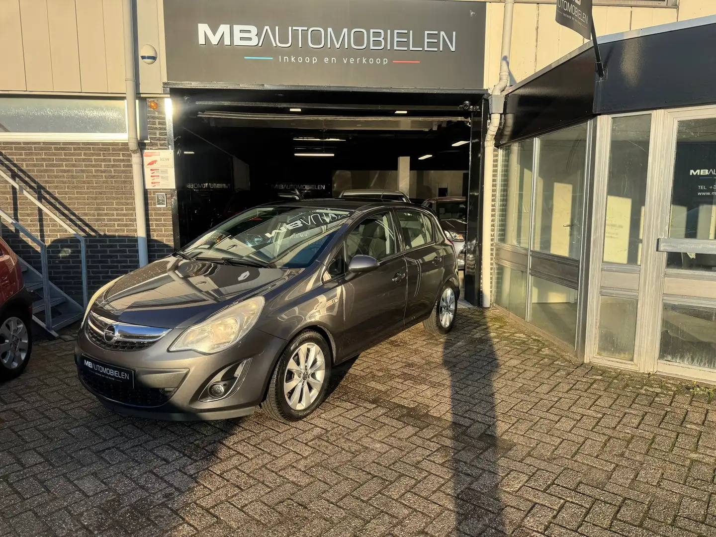 Opel Corsa 1.2-16V Anniversary Edition/5 Deurs/NAP/Airco/APK/ Grau - 1