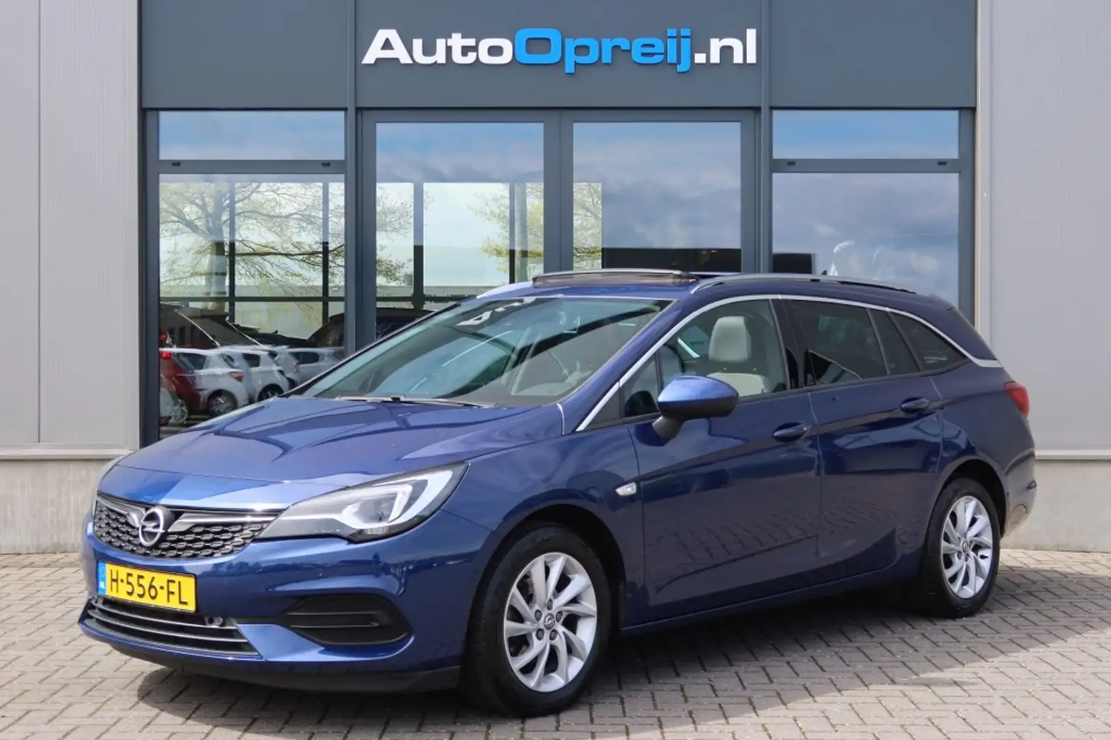 Opel Astra 1.2 Sports Tourer Elegance Clima, NAVI, Schuif/kan Blauw - 1