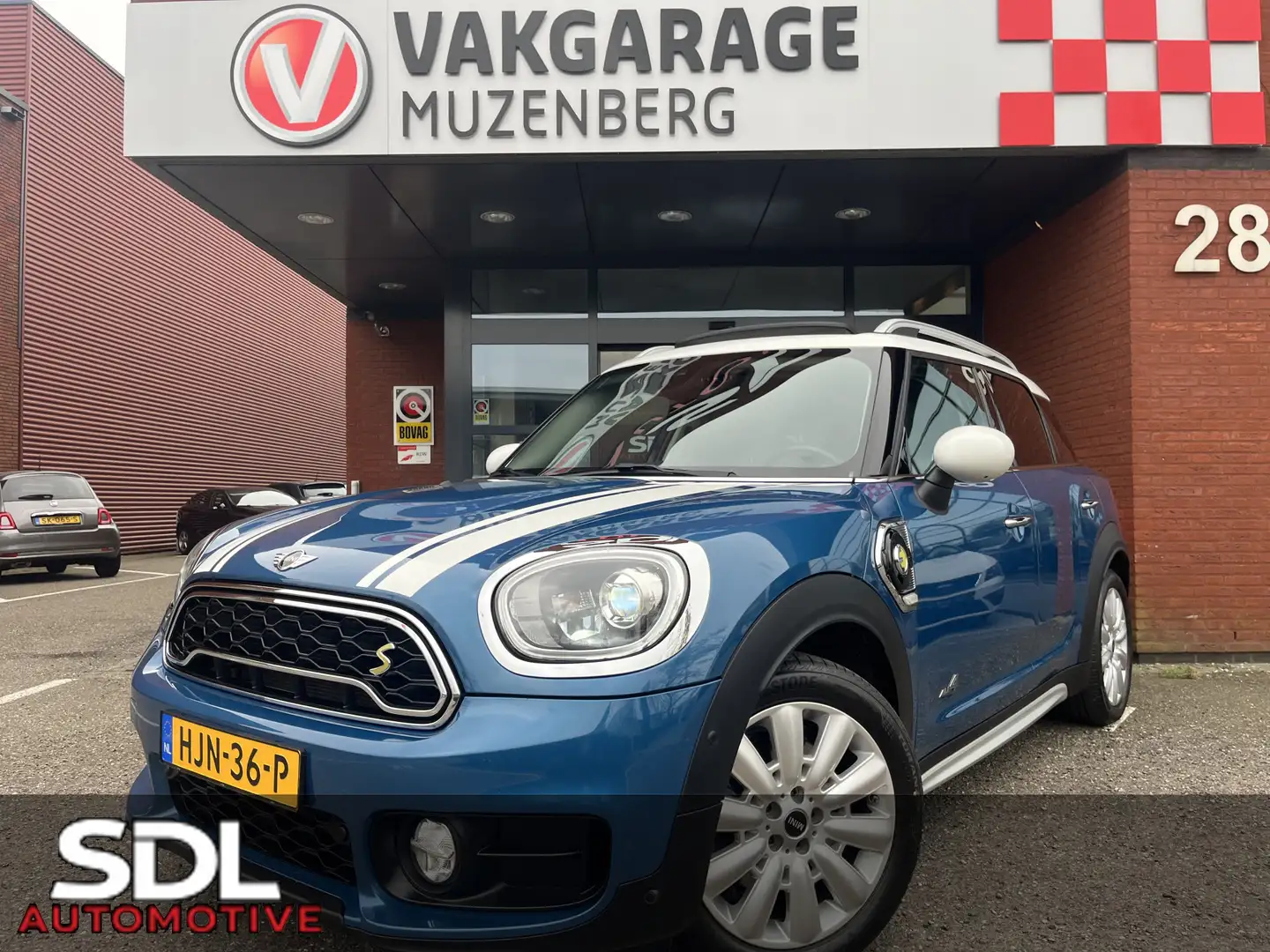 MINI Cooper S Countryman Mini 2.0 E ALL4 // FULL LED // NAVI // CAMERA // P Blauw - 1